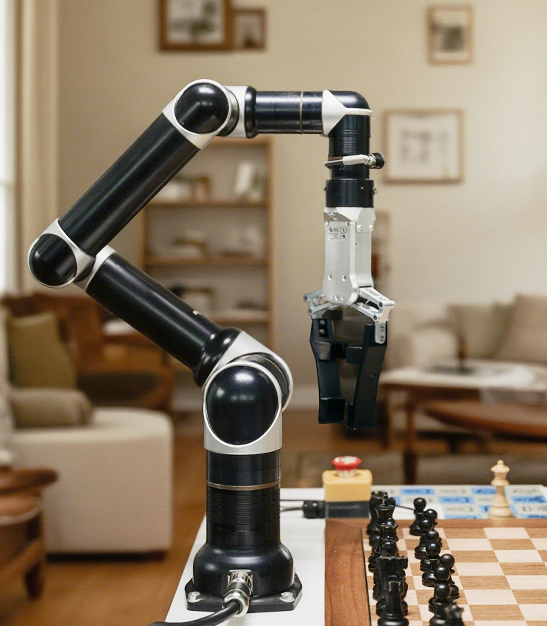 The application of advanced robotics and artificial intelligence (AI) in high-precision tasks, demonstrated by a collaborative robot arm playing chess.