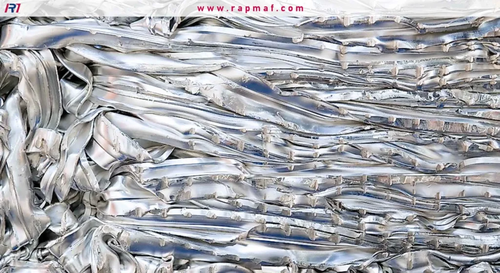 This shows a large, compressed bale of aluminum scrap. This is a common form in which aluminum is collected and transported for recycling. The scrap is then melted down to create new products.