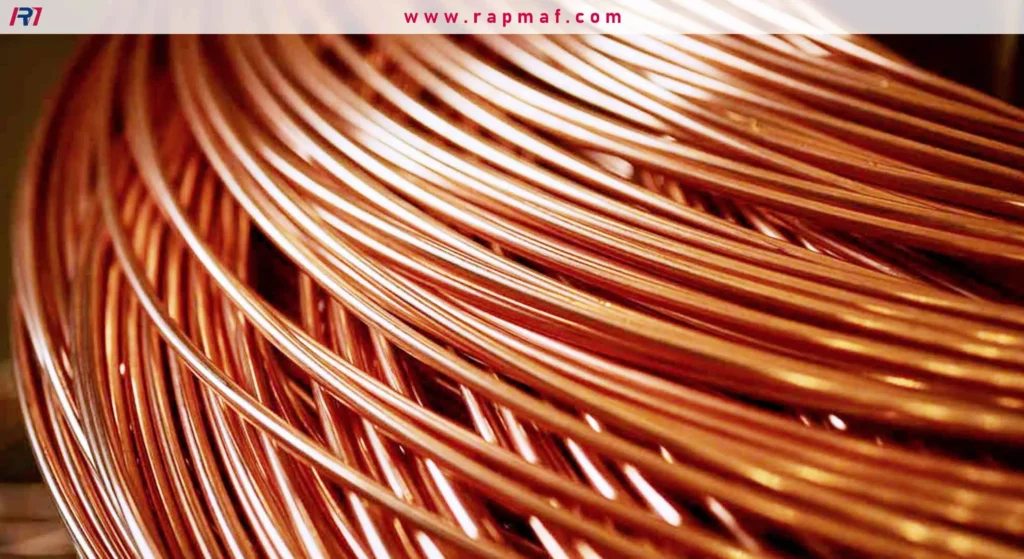 This is a close-up, artistic shot of a large bundle of thick copper wires.