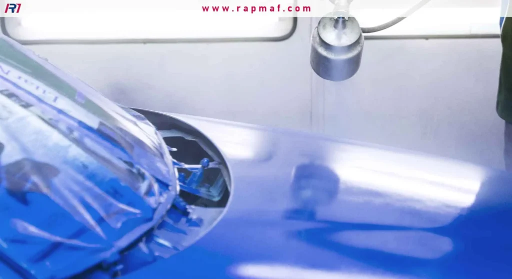 The industrial application of a liquid urethane finish onto a custom part for corrosion and abrasion resistance.