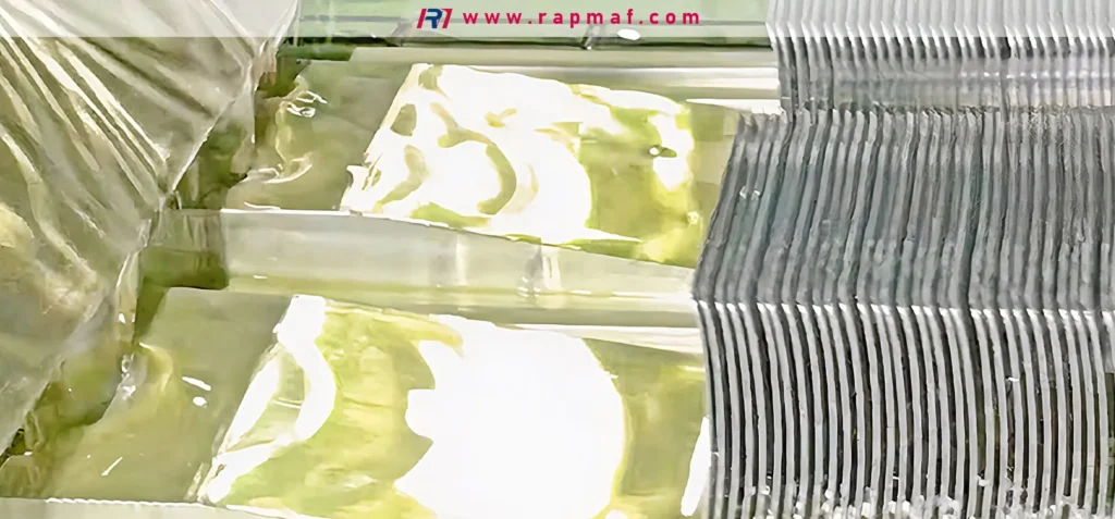A close-up view of newly machined aluminum heatsinks, stacked and ready for packaging. The high-density fins are produced through processes like extrusion or CNC machining to maximize surface area for heat dissipation.