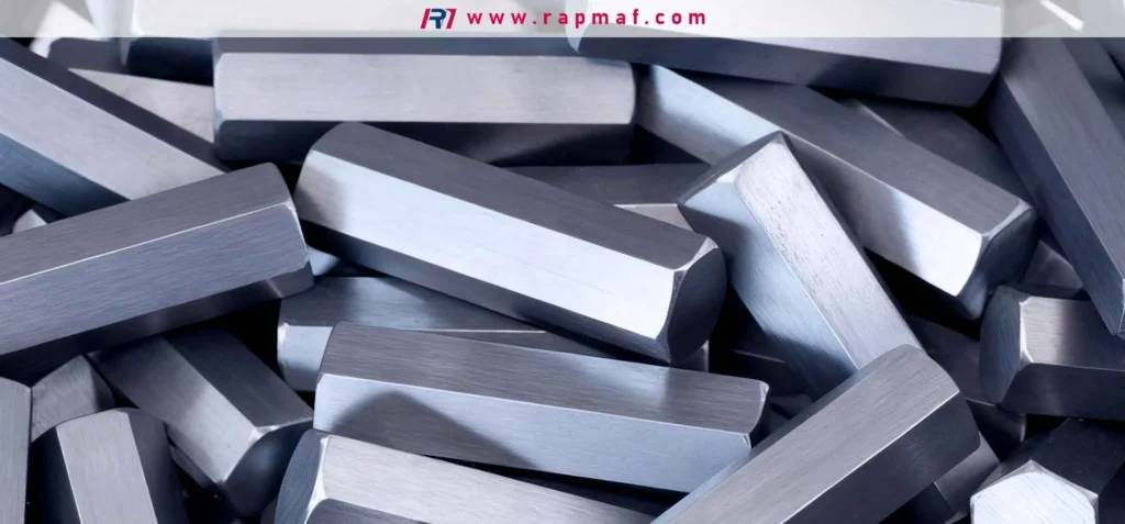 A collection of precision-cut hexagonal alloy steel bars used as stock material in manufacturing for their specific geometric profile, which aids in machining certain components.