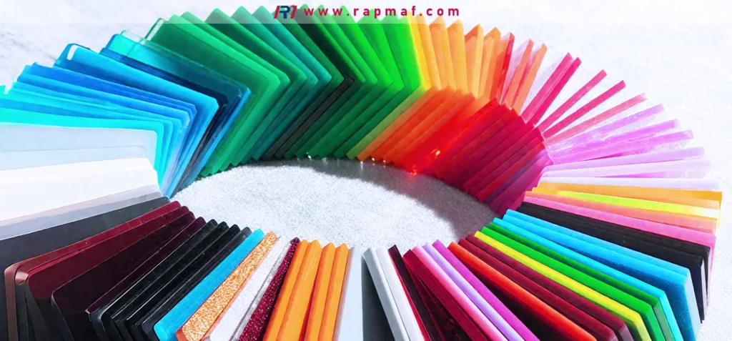 An extensive collection of acrylic plastic color swatches arranged in a circle, demonstrating the wide range of standard and custom color options for PMMA sheets and parts available from Rapmaf.