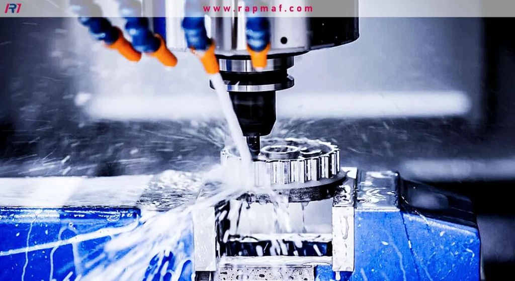 CNC milling, a subtractive manufacturing process where a rotating cutter removes material from a workpiece, shown here with heavy use of cutting fluid.