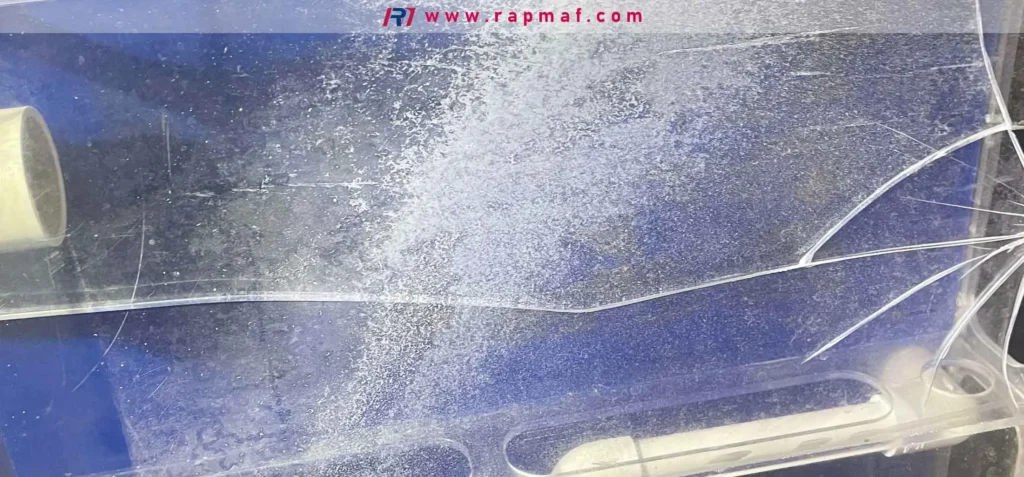 An example of brittle failure and environmental stress cracking (crazing) in an acrylic plastic part. The fine network of micro-cracks and the sharp fracture line are characteristic failure modes for polymethyl methacrylate (PMMA).
