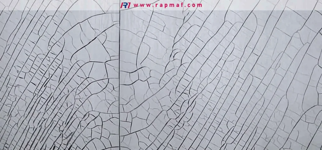 A macro photograph of environmental stress cracking (crazing) on a surface, demonstrating a common failure mode in polymers. This represents the long-term structural breakdown that can affect plastics like PET.