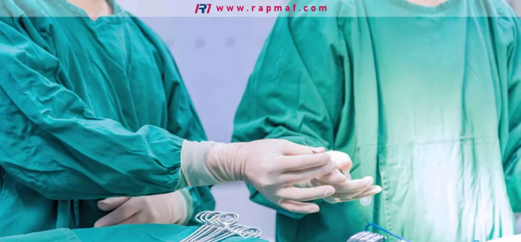 Surgeons in an operating room, demonstrating a key use of propylene. The green surgical gowns, drapes, and some sterile instruments are made from non-woven polypropylene, a durable, sterilizable plastic derived from propylene gas.
