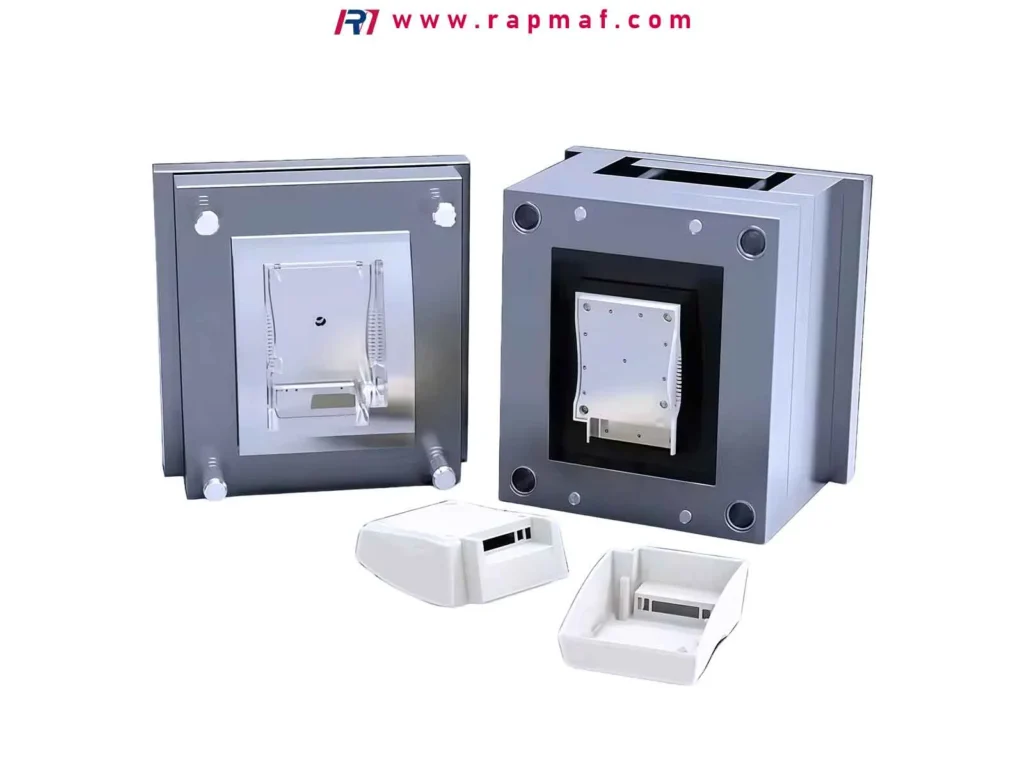 A high-quality precision injection mold (or mould) tool, with its core and cavity halves open, and the finished white plastic parts it produced. This image perfectly demonstrates the industrial manufacturing definition of the word 'mold'.