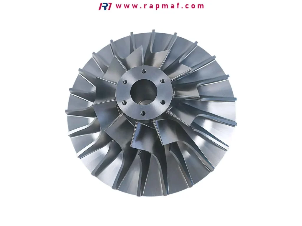 A high-precision, 5-axis CNC machined centrifugal impeller for a turbocharger or pump, showcasing the complex blade geometry and flawless surface finish achievable by Rapmaf.
