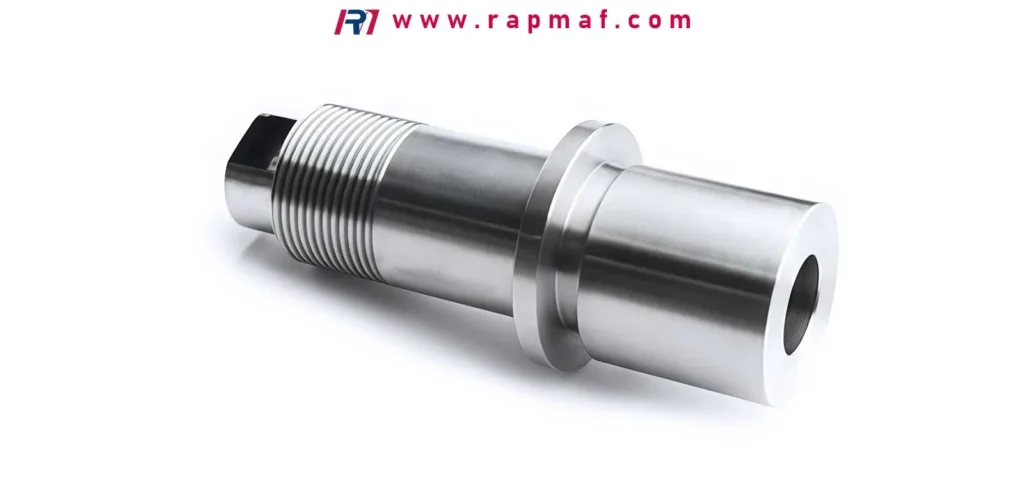 A complex, custom CNC turned and milled part made from stainless steel by Rapmaf, featuring a flange, external threads, and a central bore—an ideal example for comparing the machinability and properties of different steel grades.