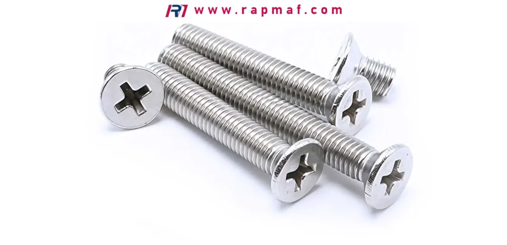 Several stainless steel machine screws with a flat, countersunk head and a Phillips cross drive, manufactured by Rapmaf for applications requiring a flush surface finish.
