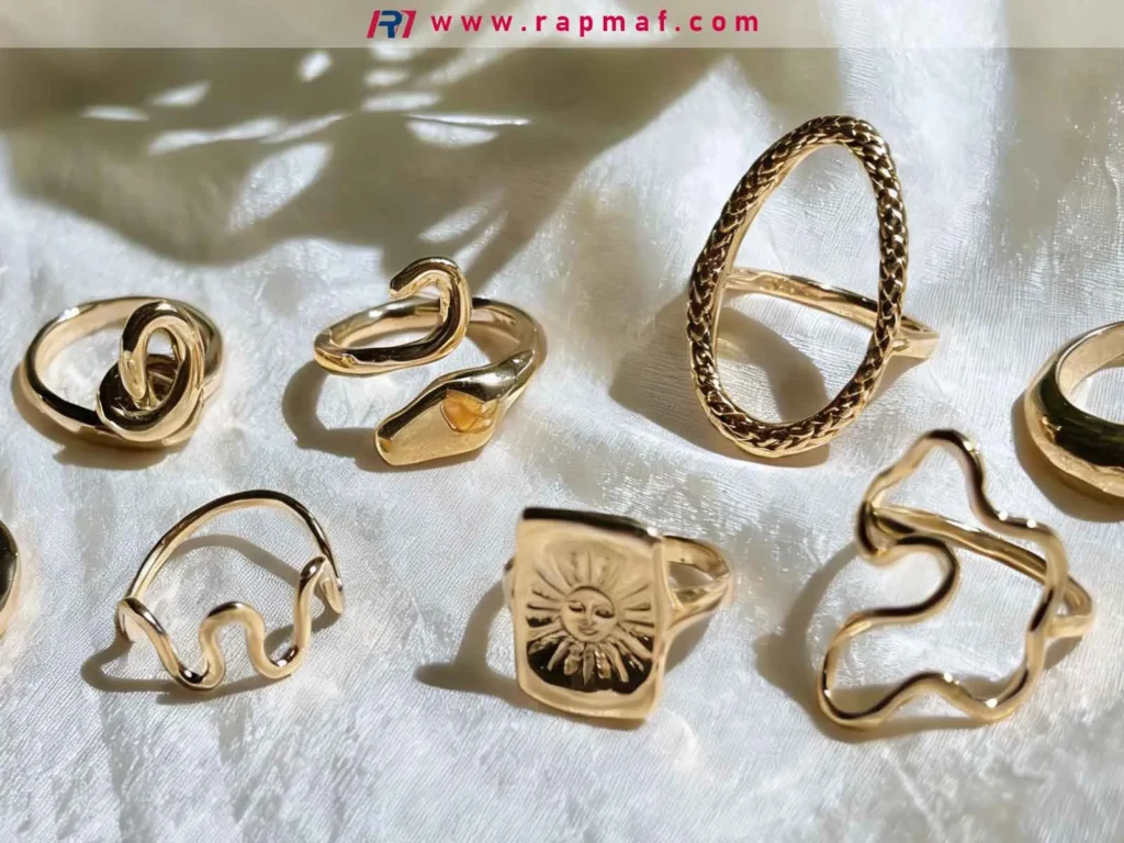 An assortment of decorative brass rings with intricate designs, showcasing the material's excellent aesthetic appeal, corrosion resistance, and formability for consumer products and jewelry.
