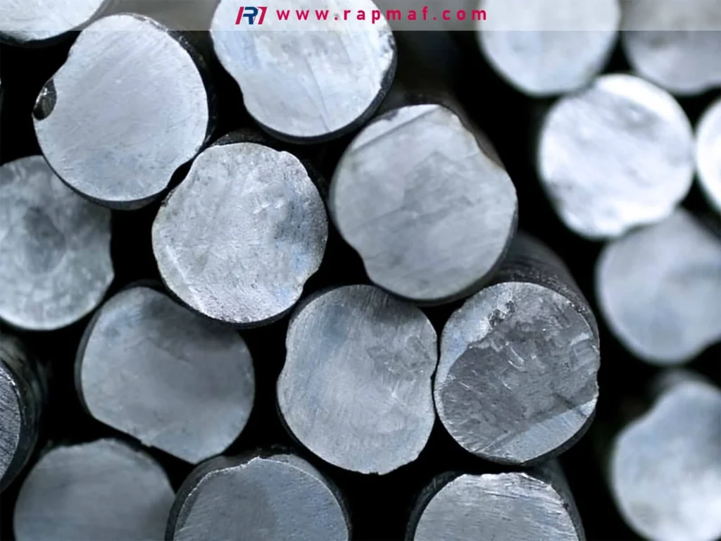 A bundle of raw, hot-rolled carbon steel round bars, a strong and versatile stock material used for forging and CNC machining applications where toughness is a key requirement.