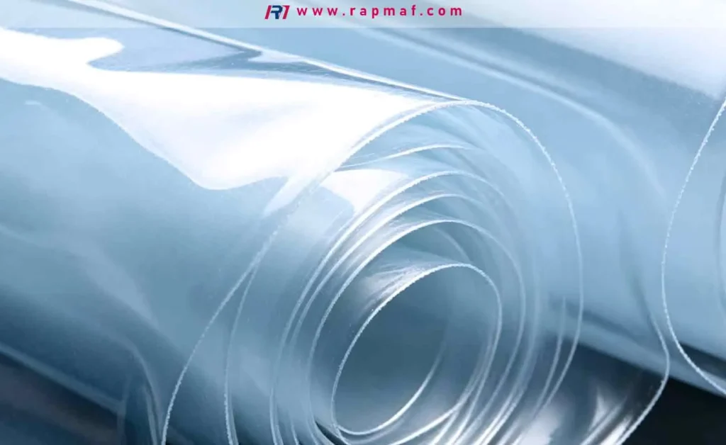A large industrial roll of clear polyethylene (PE) film from Rapmaf, a common material used for packaging, moisture barriers, and protective sheeting.
