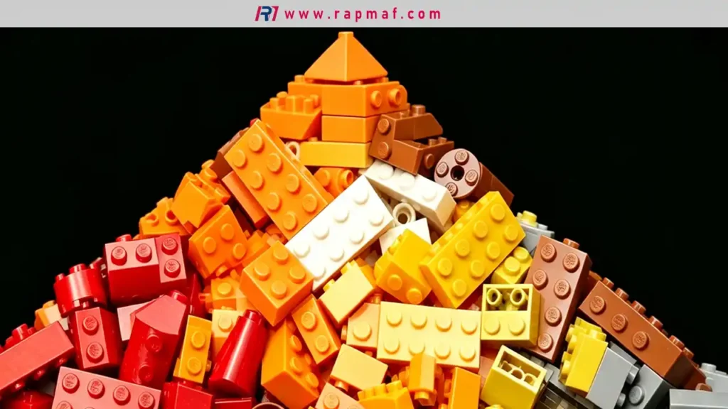 A Rapmaf image of a large, colorful pile of LEGO bricks, used as a prime example of parts made from durable, high-precision ABS plastic, a key material discussed in the guide to 3D printing filaments.